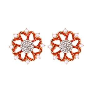 Retro floral alloy earrings with red enamel petals, sparkling diamonds, and white pearls