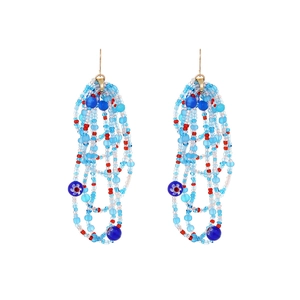 Handmade bohemian beaded tassel earrings in sky blue with floral ceramic accents