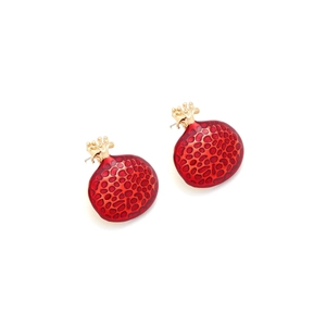 Detailed view of pomegranate stud earrings with red enamel fruit and golden texture
