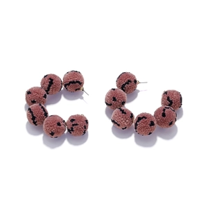 Retro handmade C-shaped fuzzy ball hoop earrings in dusty pink with black spotted patterns
