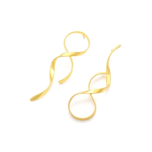 Detailed view of asymmetric gold metal ribbon twist earrings with elegant spiral design
