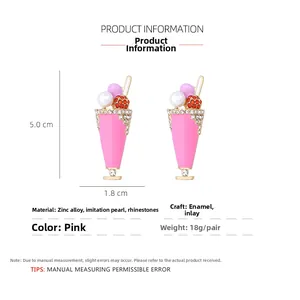 Detail view of pink enamel ice cream cup earrings with pearls and rhinestones 5cm size