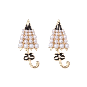 Chic alloy umbrella stud earrings with white faux pearls and black enamel bow detail
