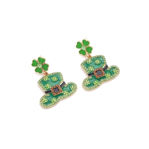 Detail view of St. Patrick's Day green hat earrings with sparkling clover and rhinestones