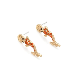 Macro detail of Chinese koi fish earrings with orange crystals and gold coin element