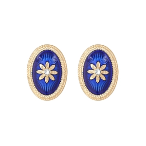 Vintage palace style oval earrings with royal blue enamel and golden flower accent