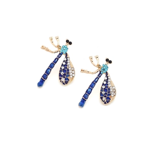 Detailed view of dragonfly earrings with blue enamel wings and inlaid rhinestones