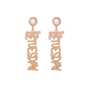 Gold Fat Tuesday drop earrings with white pearls and sparkling rhinestone letters