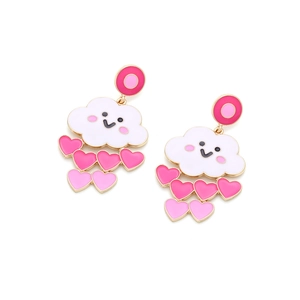 Detail of cute enamel cloud earrings with pink heart charms on a white background