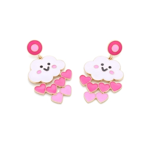 Detail of cartoon cloud earrings with smiling face and pink heart-shaped enamel drops