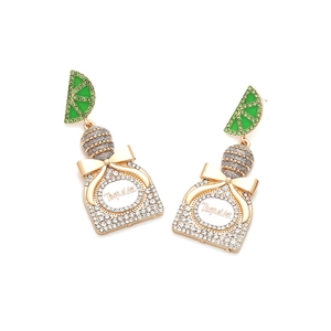 Detail of Tequila bottle earrings with lime design and sparkling rhinestones