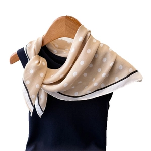 Beige silk-feel square scarf with white polka dots and elegant monochrome border