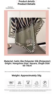 Detailed view of green zebra print silk satin scarf with elegant animal illustrations