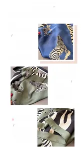 Detailed view of zebra print satin scarf featuring blue and sage green color blocking