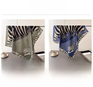 Army green and navy blue silk scarves featuring contrast zebra print and striped borders