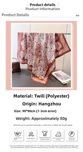 Detail view of floral print silk-like polyester square scarf with washing instructions