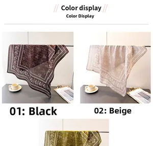 Detailed view of floral and polka dot patterns on satin scarves in multiple colors
