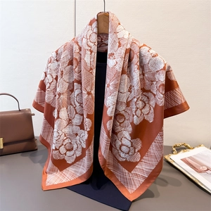 Caramel vintage floral silk square scarf with abstract sketch petals on wooden hanger