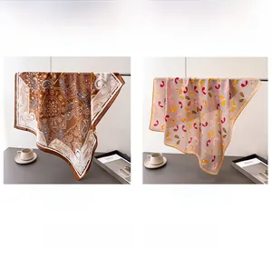 Detail showing paisley and floral prints on silky scarves with coffee and magazine