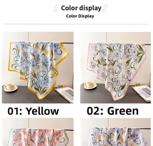 Detail showing two floral silk scarves in yellow and green with artistic tulip prints