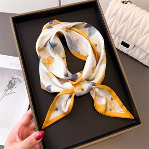 Silk-textured skinny scarf with yellow fruit print and border, elegant neck tie accessory