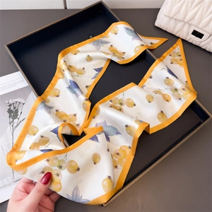 Close-up of elegant double-layered fruit pattern silk scarf with yellow berry prints