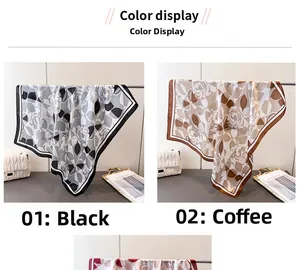 Detail view of rose print faux silk square scarves in black and coffee brown colors
