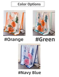 Detailed view of floral silk scarves in orange, green, and navy with premium satin finish