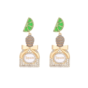 Fashionable Tequila bottle earrings with lime slices and rhinestone studded details