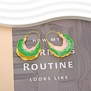 Bohemian enamel leaf earrings with green and pink drip oil texture on a gold frame