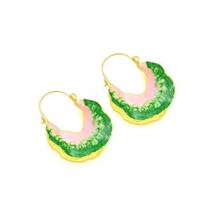 Detail of artistic leaf earrings with pink and green enamel in gold settings