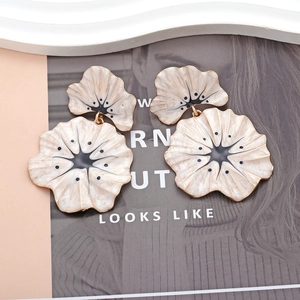 Exaggerated large flower drop earrings with cream enamel petals and gold metal trim