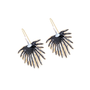 Detail of fan-shaped enamel earrings featuring black and white striped leaf design