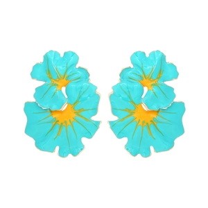 Exaggerated green enamel flower earrings with yellow centers and wavy petal design