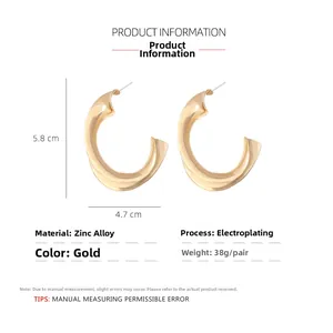 Detailed dimensions of gold C-shape twisted metal hoop earrings showing size and weight