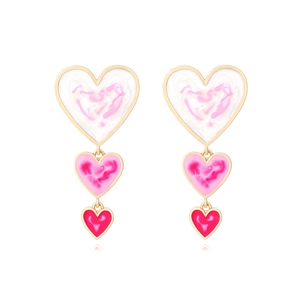 Handmade gold-rimmed layered heart drop earrings with pink gradient enamel finish