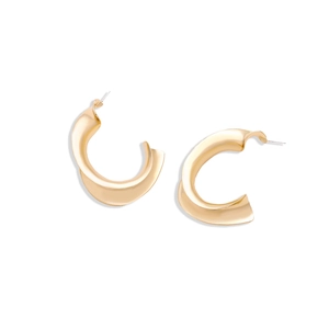 Golden spiral twisted C-shape hoop earrings with satin metallic finish on white background