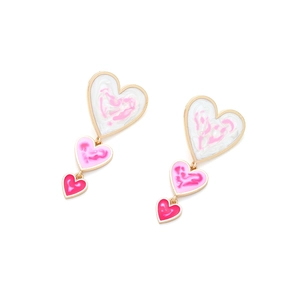 Handmade gradient enamel heart drop earrings with tiered pink hearts in gold metal frames