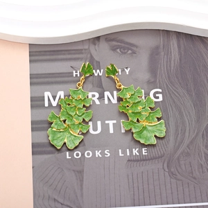 Chic green enamel ginkgo leaf dangle earrings with gold plating for a natural forest style