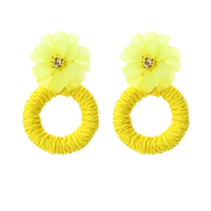 Handmade resin flower earrings with woven raffia hoops for a vibrant vacation style
