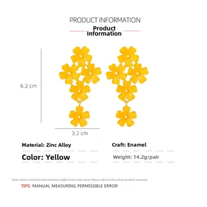 Detailed view of yellow enamel daisy drop earrings with exact size and material specs