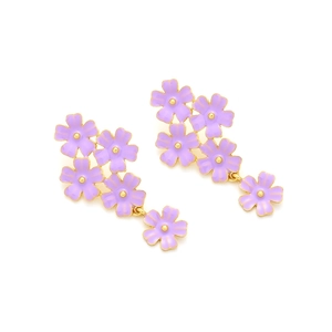 Detailed view of layered purple enamel daisy earrings with elegant gold-tone metal trim