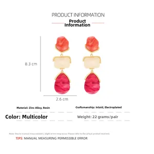 Detailed view of geometric acrylic drop earrings with 8.3cm x 2.6cm size measurements