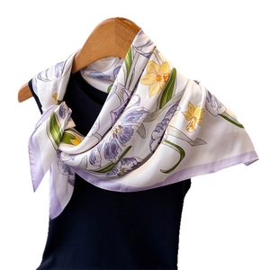Elegant silk scarf with purple lily and yellow daffodil prints on white and lilac base