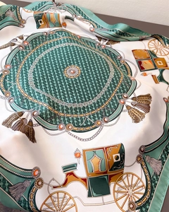 Detail of silk scarf with classical carriage print, mint green tassels and chain pattern