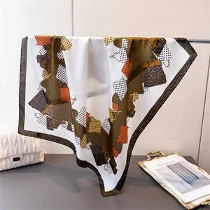 Elegant leopard print silk-like square scarf featuring handbag patterns and animal borders