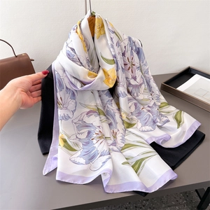 Elegant floral silk scarf with purple and yellow tulip prints on white background