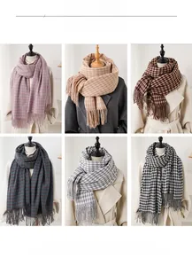 Close-up of six color variations of houndstooth scarves with long tassel edges