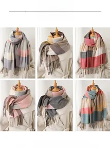 Detail showing various plaid patterns and fringe textures of these cashmere-like scarves