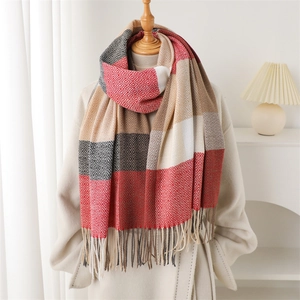 Plaid cashmere-like shawl with red and grey checkered pattern and long fringe tassels